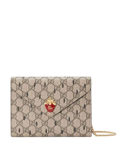 gucci strawberry mini wallet.